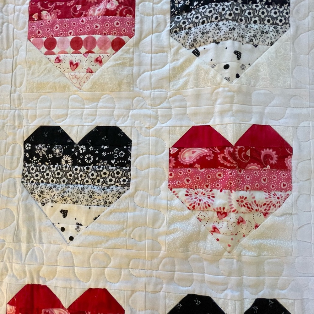 Heart Pattern Quilt with Red and Black Accents